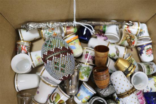 Five thimble display domes and a collection of ceramic, treen and other thimbles,